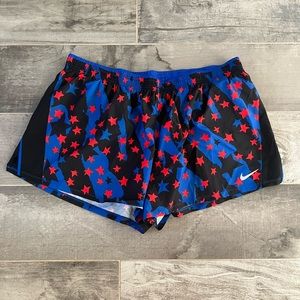 Nike running shorts. Blue and black with red stars, 2XL.